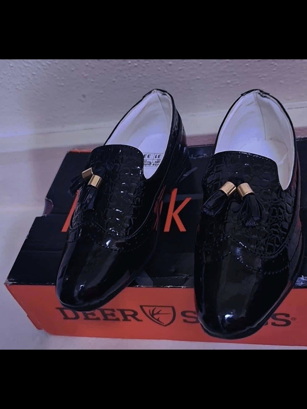 Deer Stags Black Patent Tassel Loafers with Gold Accents